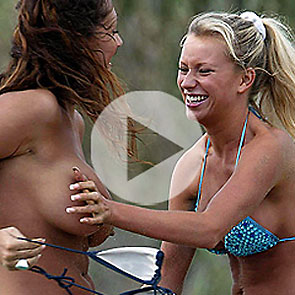 girl friends grabbing each other's boobs in bikinis